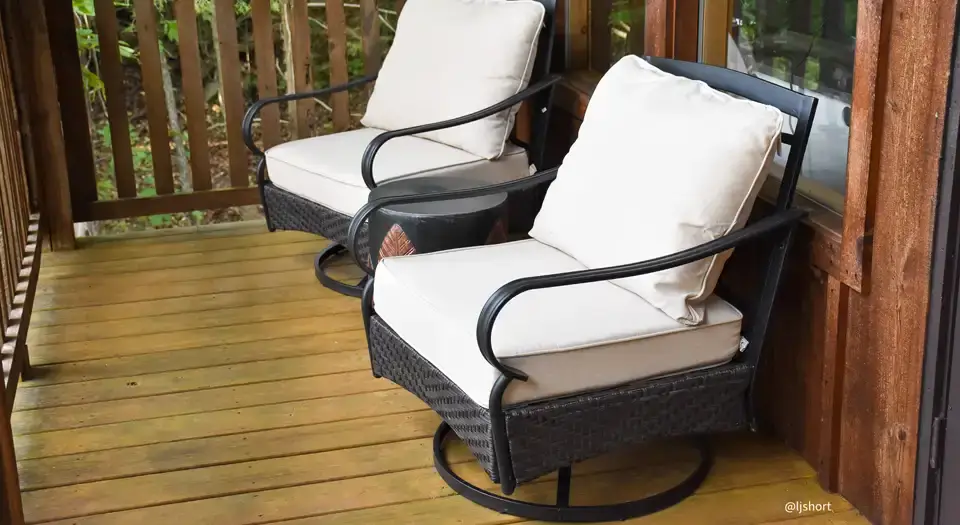 Chairs on the front porch of the cabin at Eureka Springs Riverview Oasis