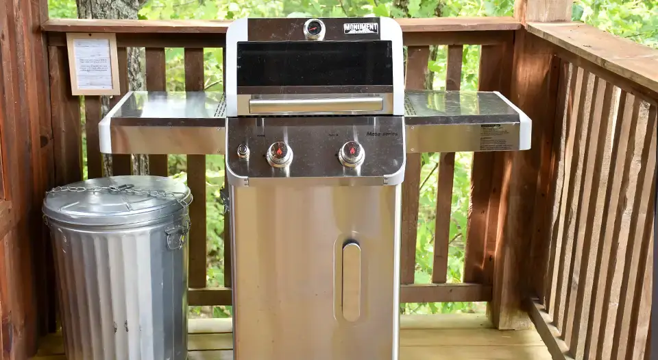 Gas grill on the back deck of the cabin at Eureka Springs Riverview Oasis